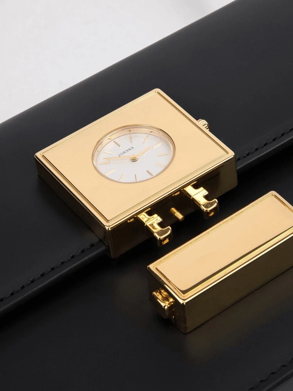 Sleek Black Shoulder Bag with Gold Clock Accent